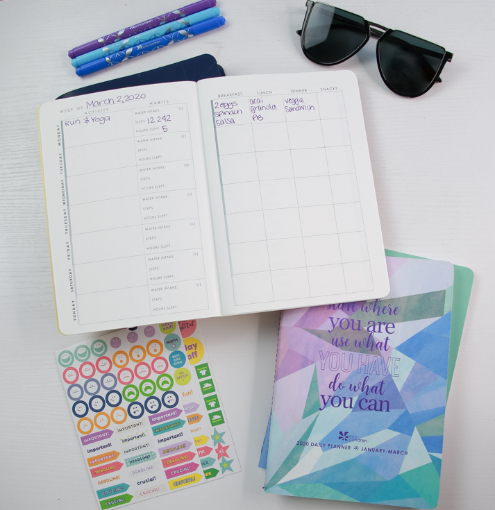Marathon Training Guide With Erin Condren featured by The Fashionista Momma; flat lay of planner